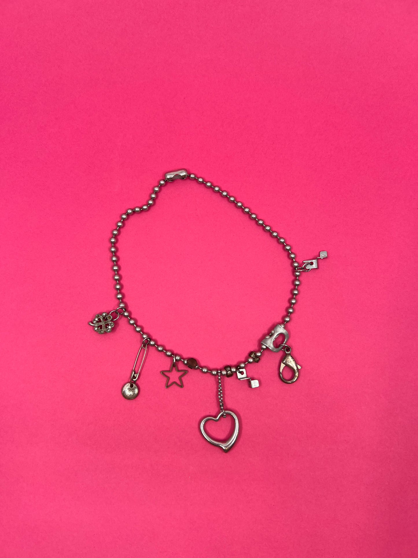 needs theory: Charm Necklaces