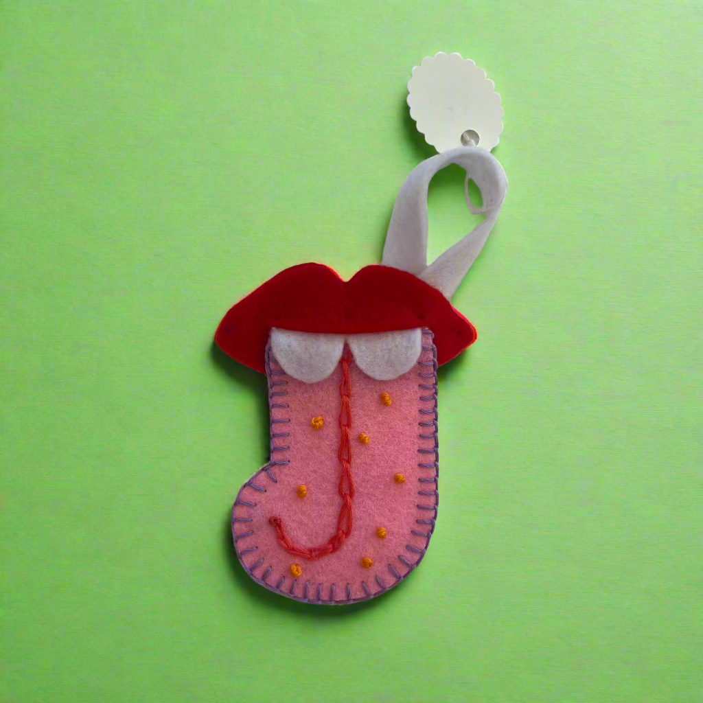 Suzan Choy: Tongue Out Stocking Ornament