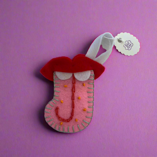 Suzan Choy: Tongue Out Stocking Ornament