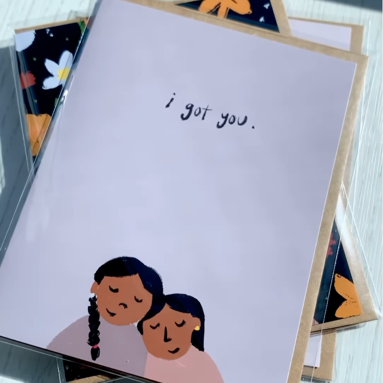 Card with illustration of two people and 'I got you.' text on a light purple background