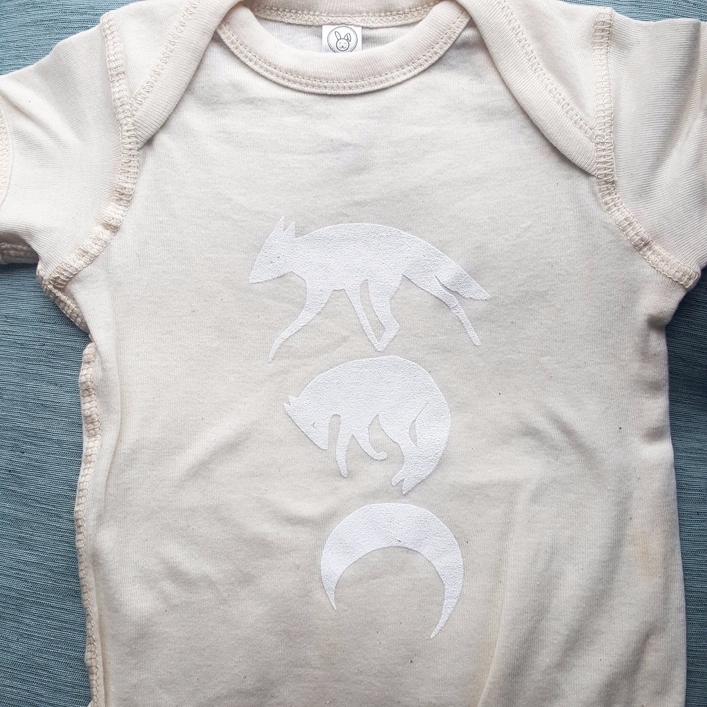 Sarofox: Moon Phases Onesie