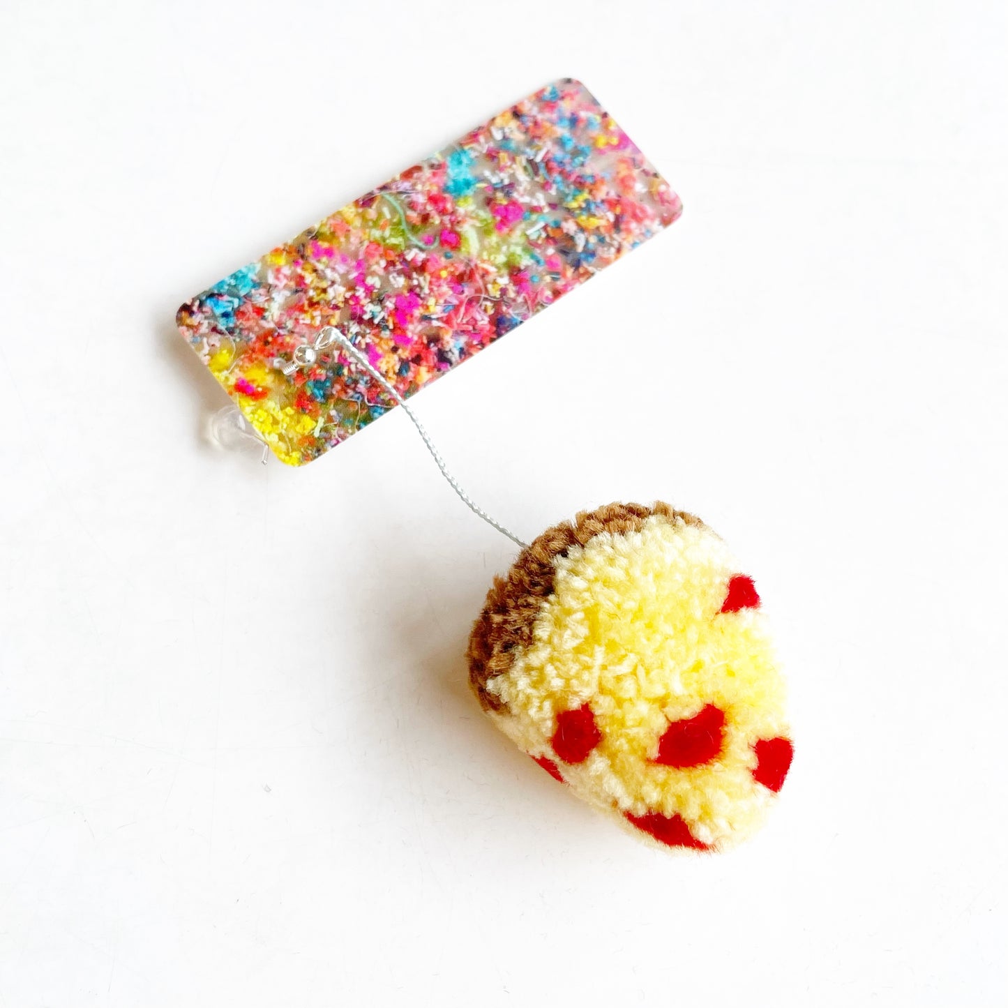 Karyn Lao: Pompom Earrings