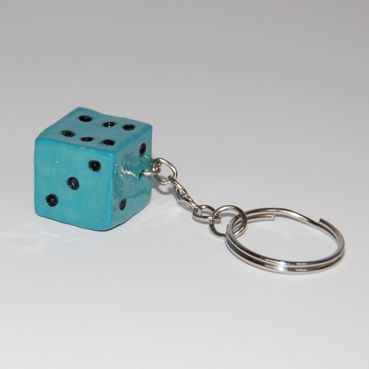 Sholeh Hajmiragha: Dice Keychains