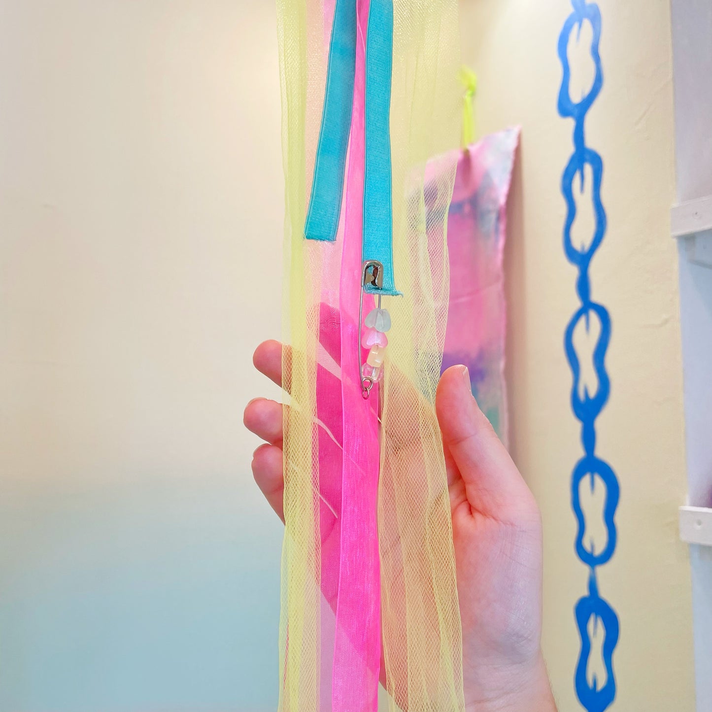 Sabrina Sims: ribbon & fabric hangings